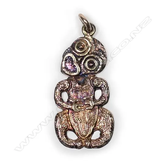 A 9ct rose gold vintage hei tiki pendant/charm,