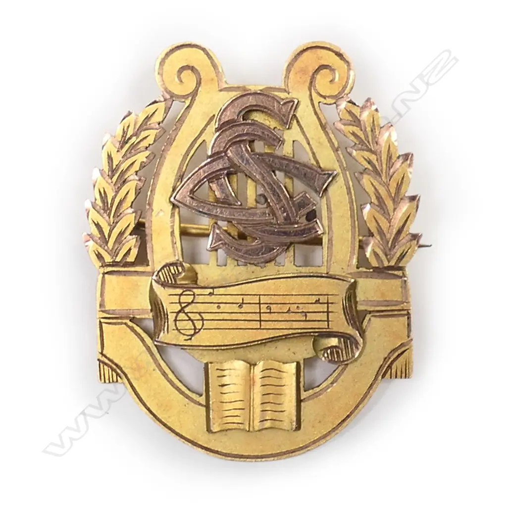 A NZ 1939 Stewart Dawson & Co. 9ct. gilded rose gold music medallion brooch, Image 1++