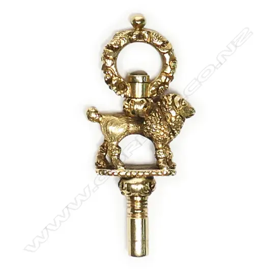 A 19thC gold fancy poodle mounted watch key,