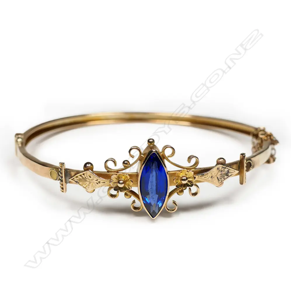 An Edwardian 9ct gold hinged snap bangle, Image 1++