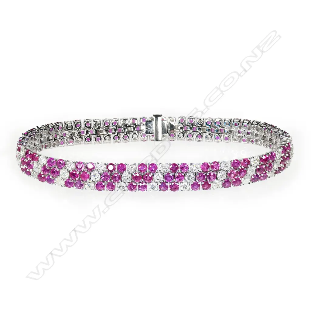 A 14ct white gold, diamond and ruby cluster style bracelet, Image 1++