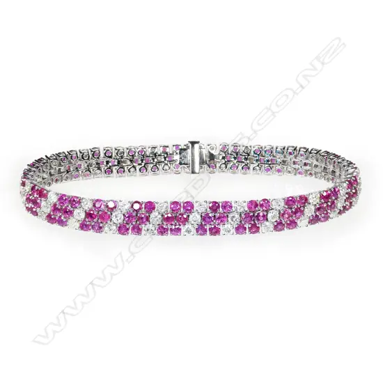 A 14ct white gold, diamond and ruby cluster style bracelet,