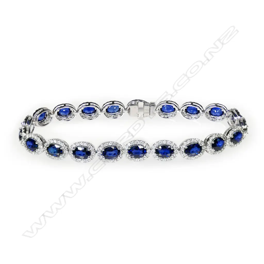 A 14ct white gold, sapphire and diamond halo tennis bracelet, Image 1++