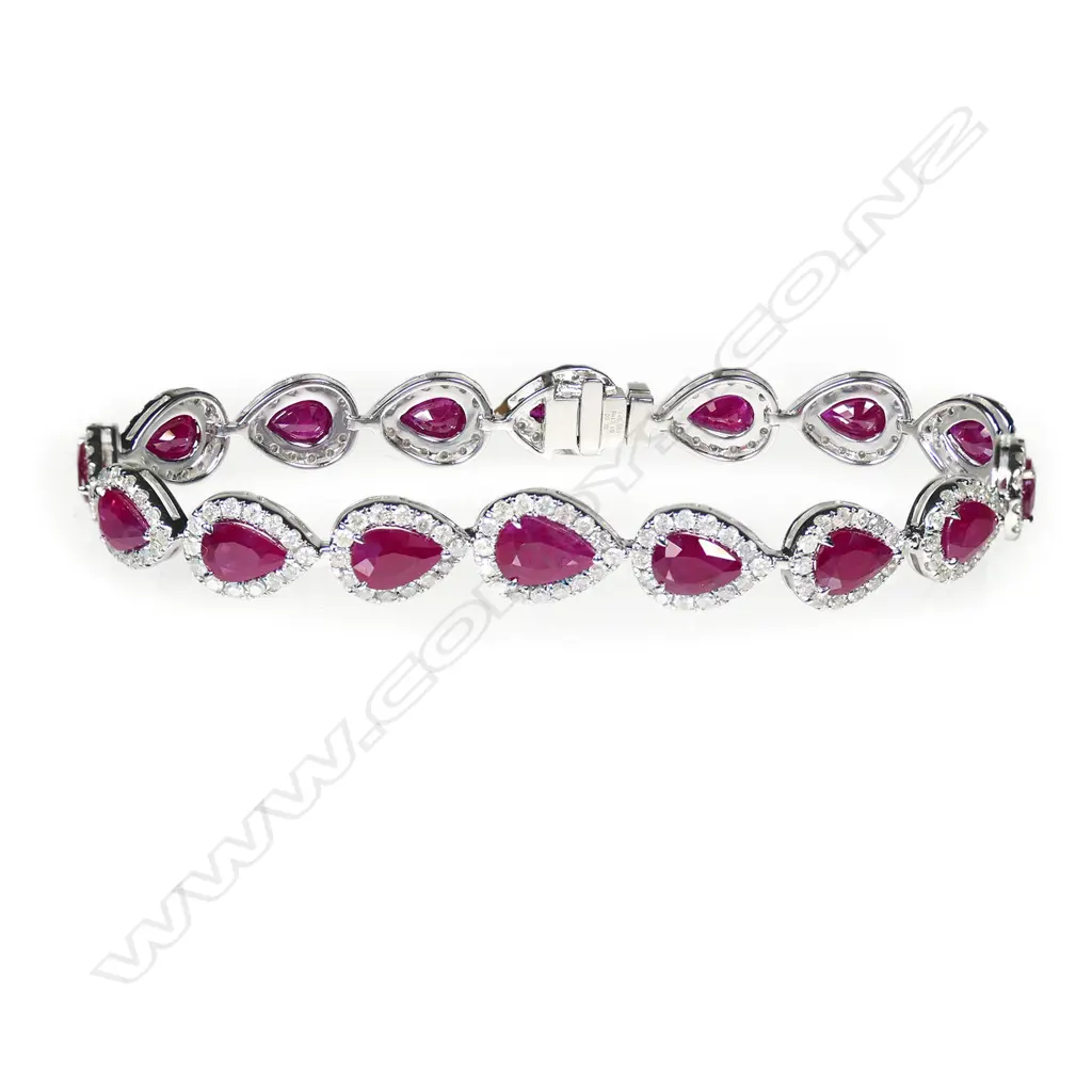 A 14ct white gold, Burmese ruby and diamond halo tennis bracelet, Image 1++