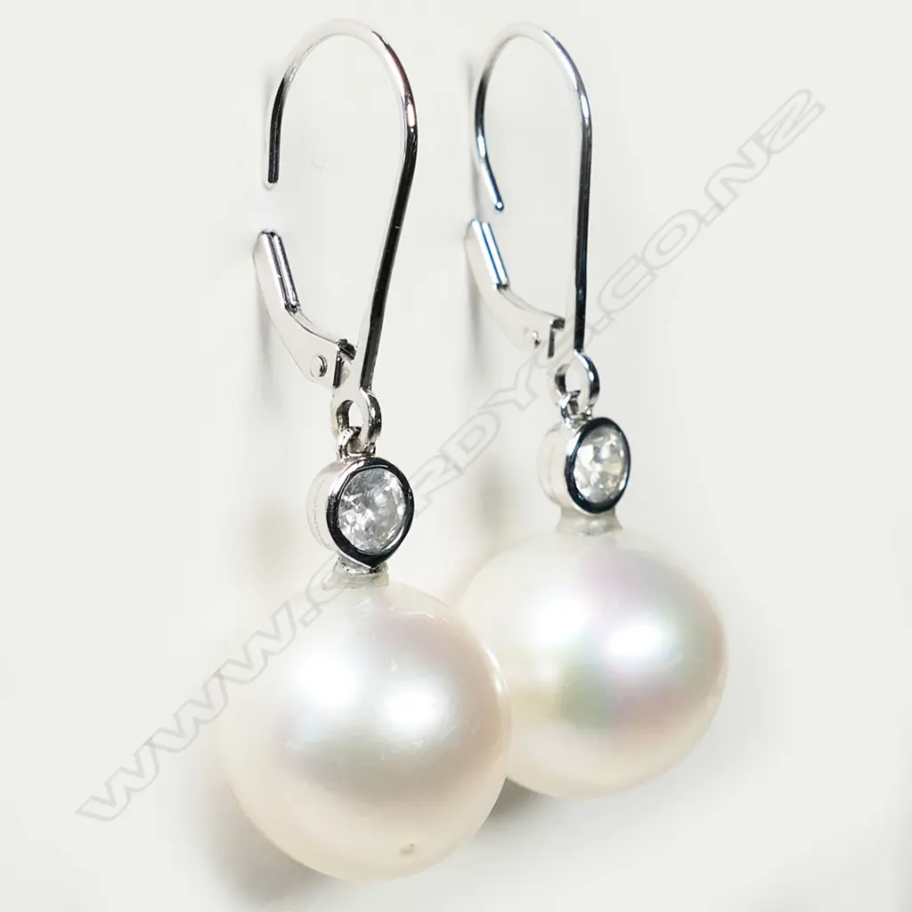 A pair of 14ct white gold cultured South Sea pearl drop earrings, Image 1++