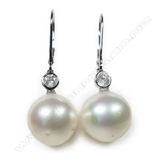 A pair of 14ct white gold cultured South Sea pearl drop earrings,