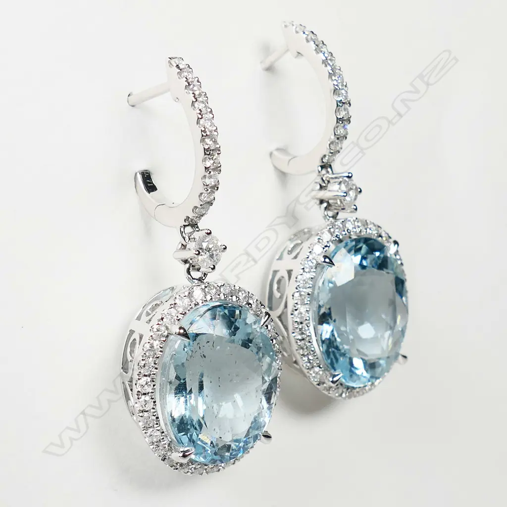 A pair of 14ct white gold, aquamarine and diamond halo huggie drop earrings, Image 1++