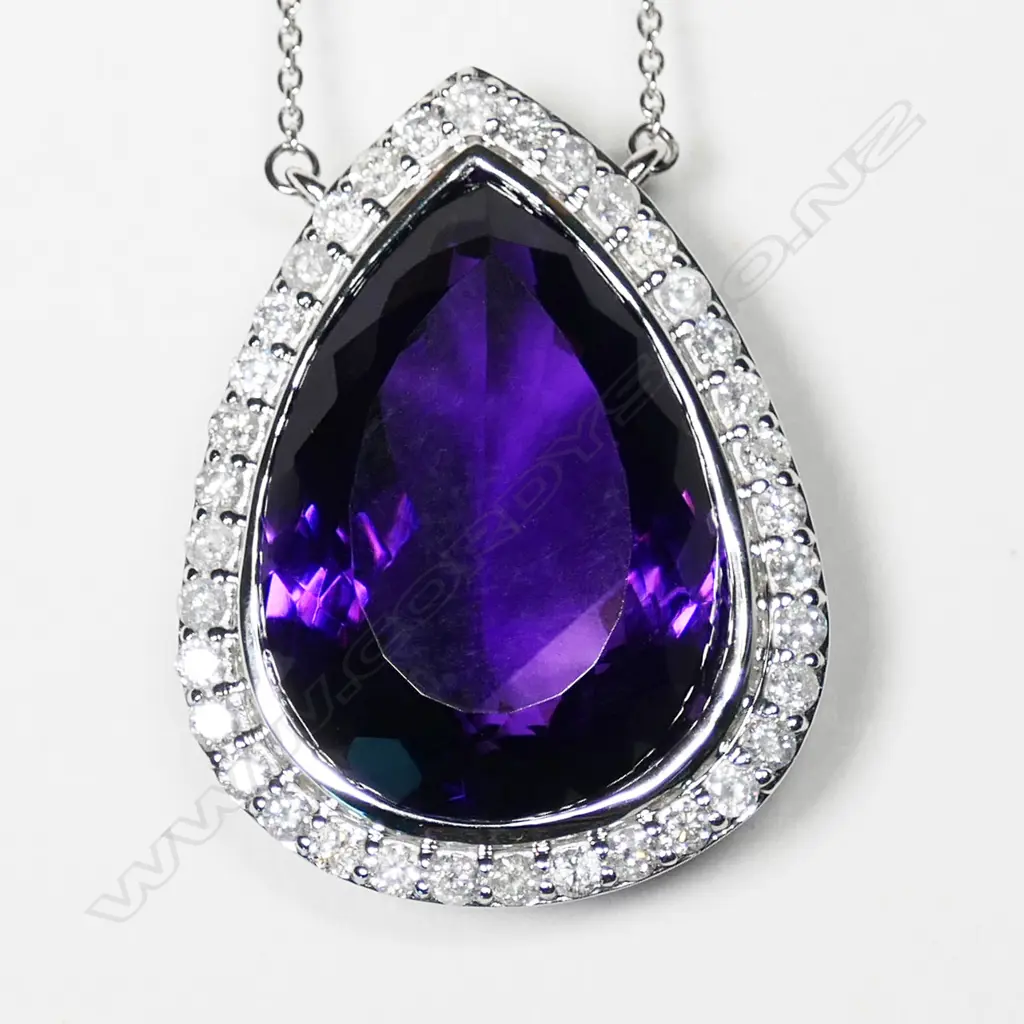 A 14ct white gold, amethyst and diamond  necklace, Image 1++