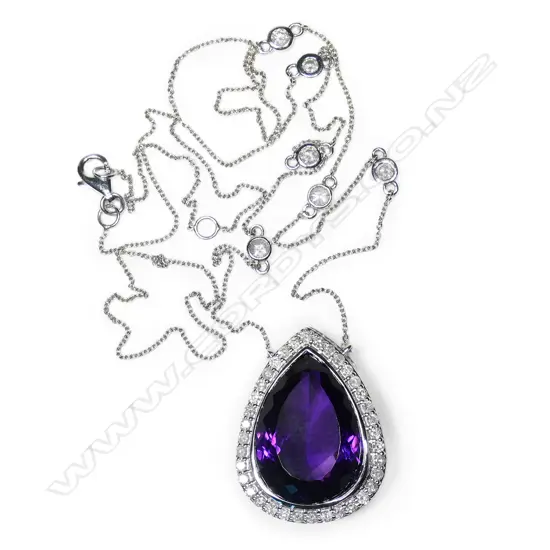 A 14ct white gold, amethyst and diamond  necklace,