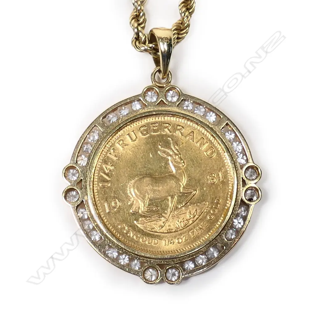A ¼ Krugerrand gold coin in diamond set frame on chain, Image 1++