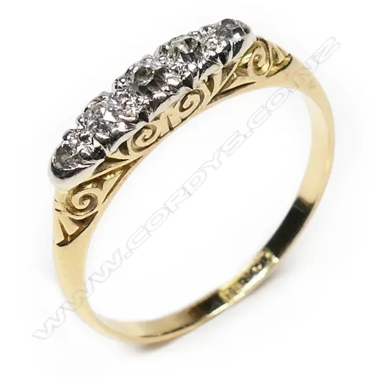 A vintage 18ct yellow gold five stone diamond ring,