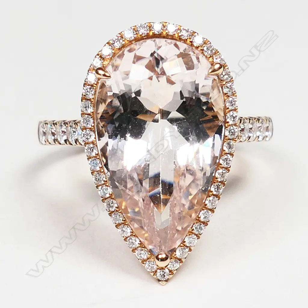 An 18ct rose gold, morganite and diamond halo ring, Image 1++