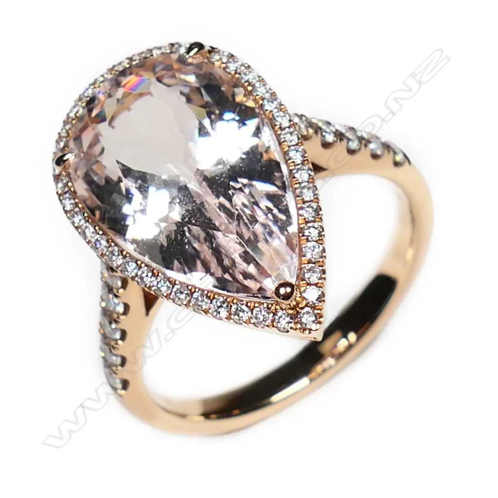 An 18ct rose gold, morganite and diamond halo ring, Image 1++