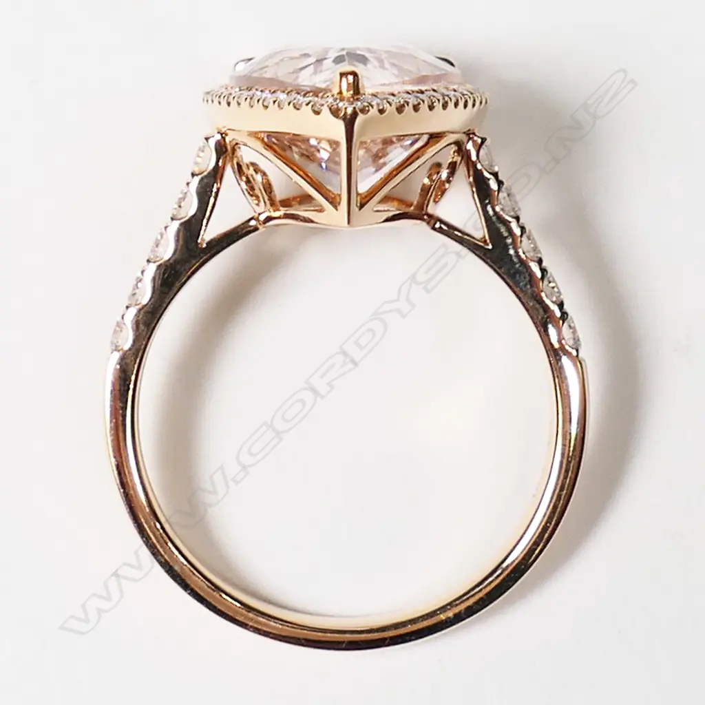 An 18ct rose gold, morganite and diamond halo ring, Image 1++
