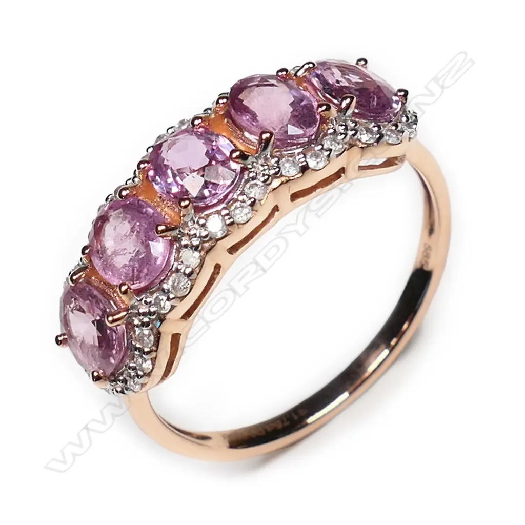 A 14ct rose gold, pink sapphire and diamond eternity ring, Image 1++