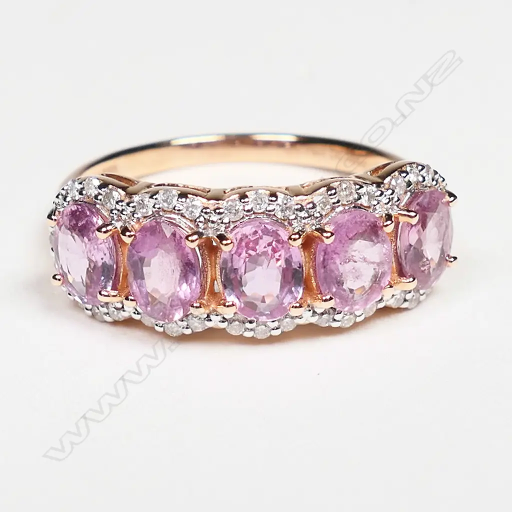 A 14ct rose gold, pink sapphire and diamond eternity ring, Image 1++