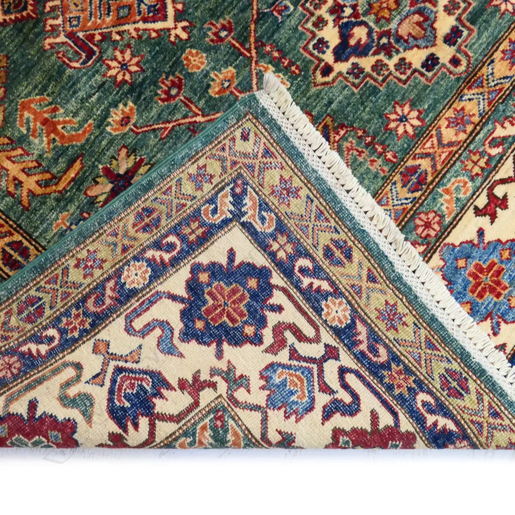 A hand knotted wool pile Kazak rug, Image 1++