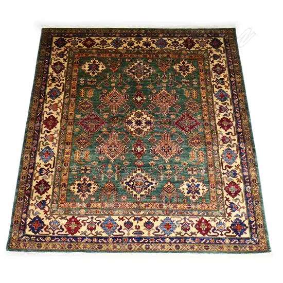 A hand knotted wool pile Kazak rug,