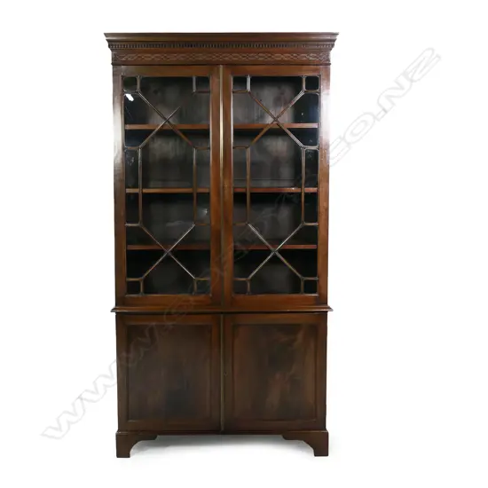An early 1900s Victorian style bookcase cabinet,