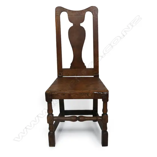 A George III  oak country hall chair,