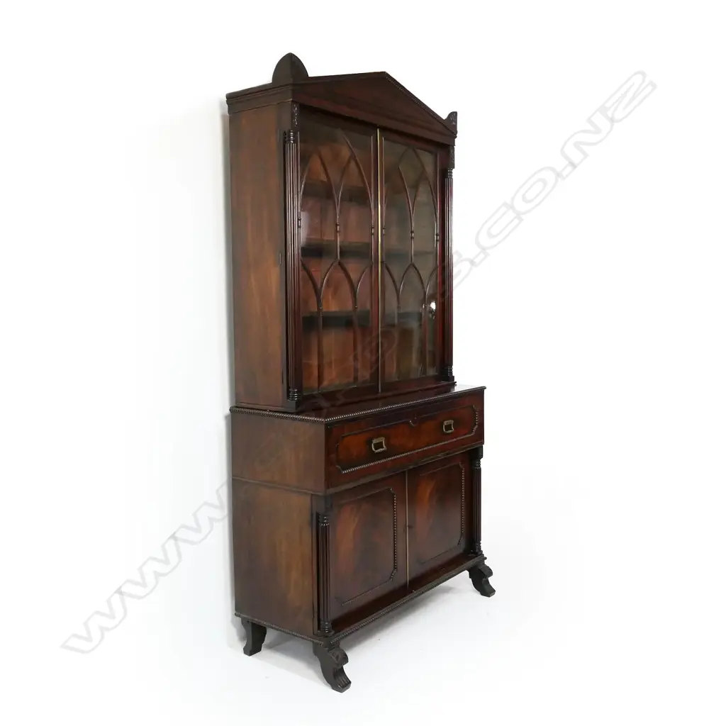 A fine Regency mahogany bookcase secretaire, (SHOULD READ: HEIGHT 2470mm) Image 1++