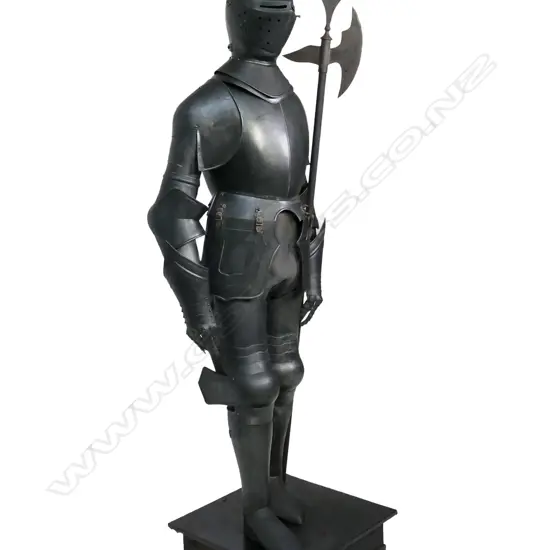 A reproduction medieval suit of armour,