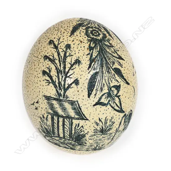 An ostrich egg, decorated in Aesthetic Movement manner,