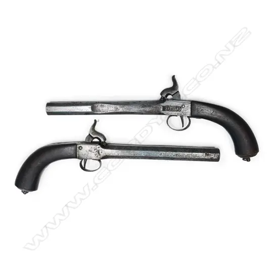 A pair of late 18thC French or Belgium percussion pistols, with belt hangers,