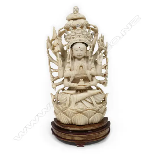 An ivory carved Guanyin statue, with eighteen arms,