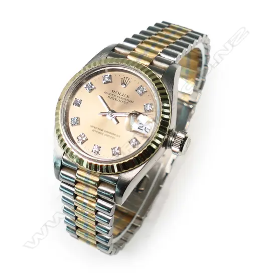 An 18ct white gold Rolex Date-just Oyster Perpetual lady's watch, 26mm, fluted yellow gold bezel,