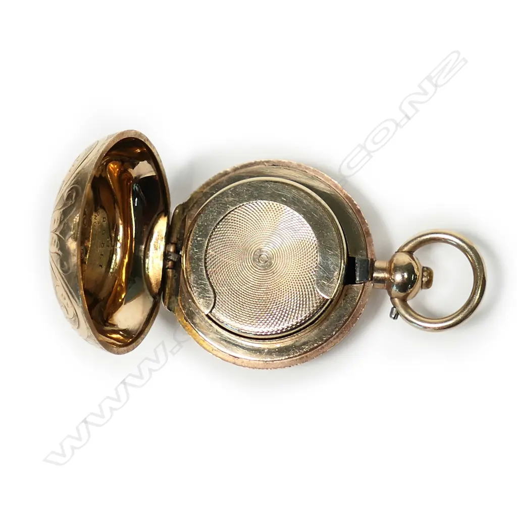 A c.1900 Dennison gold plate sovereign case, scroll engraved, push-button release, sprung interior. Image 1++