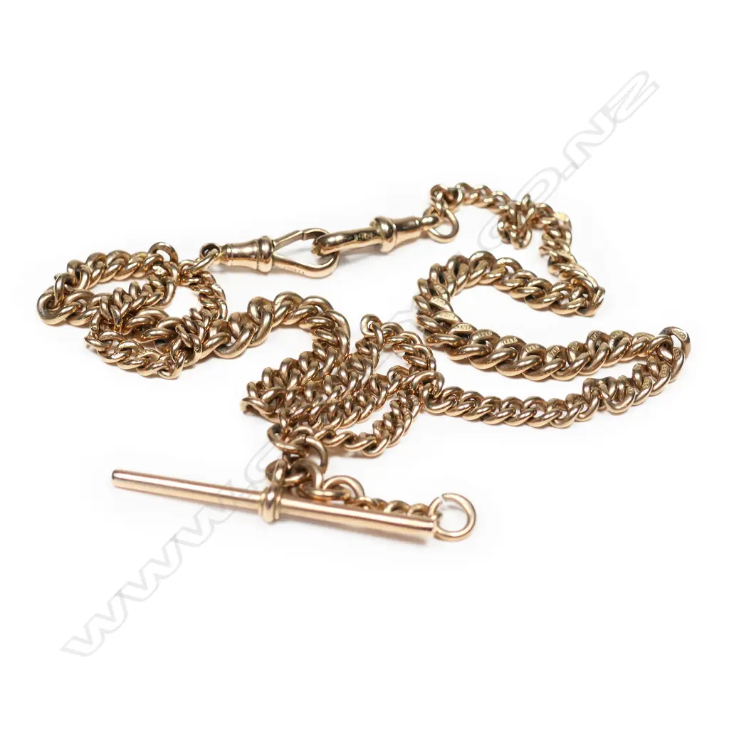 A c.1900 9ct rose gold Albert chain, T-bar and two 'dog' clips attached. L.380mm. 19.65gm. Image 1++