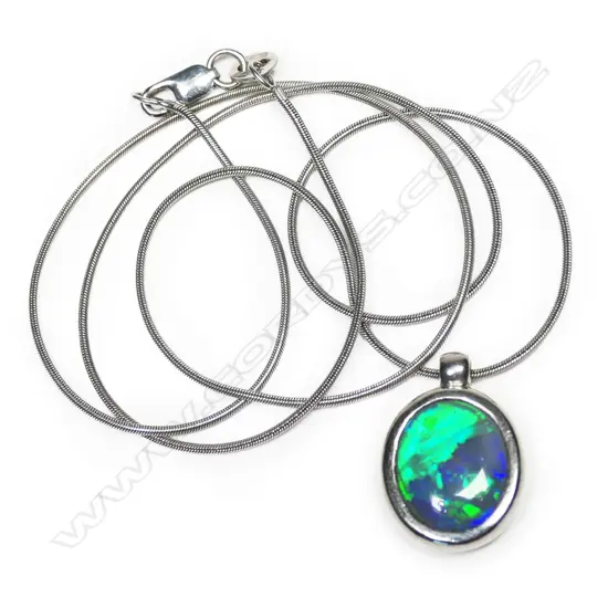An 18ct white gold and black opal pendant,
