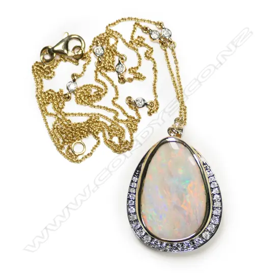 A 14ct gold, natural white opal and diamond pendant necklace,