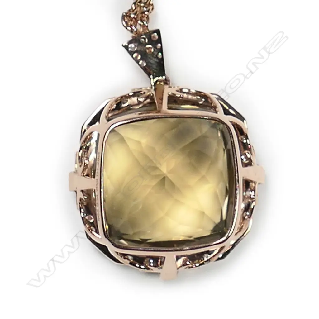 A 14ct rose gold, lemon quartz and diamond halo pendant necklace, Image 1++