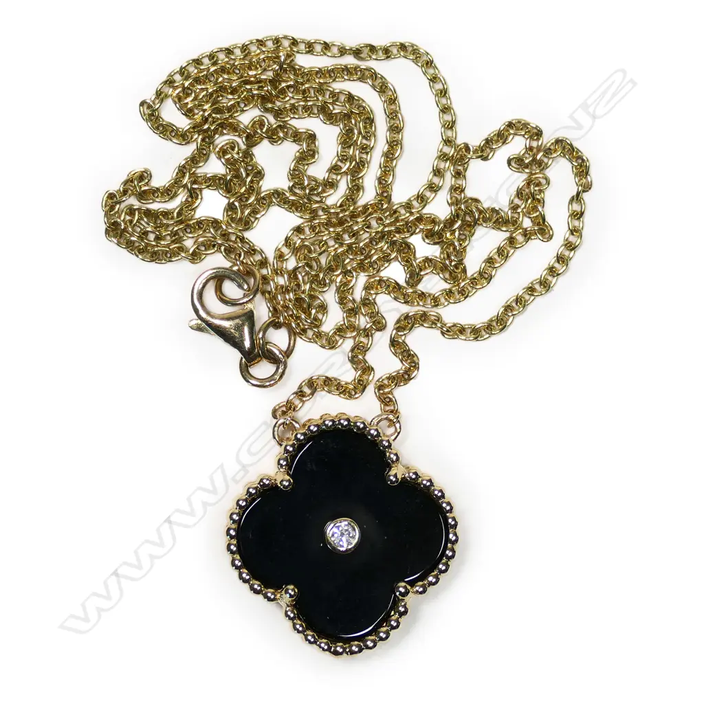 An 18ct gold, onyx and diamond Van Cleef inspired pendant necklace, Image 1++