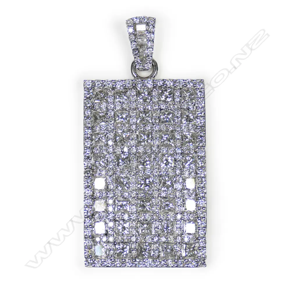 An 18ct white gold and diamond pendant, Image 1++