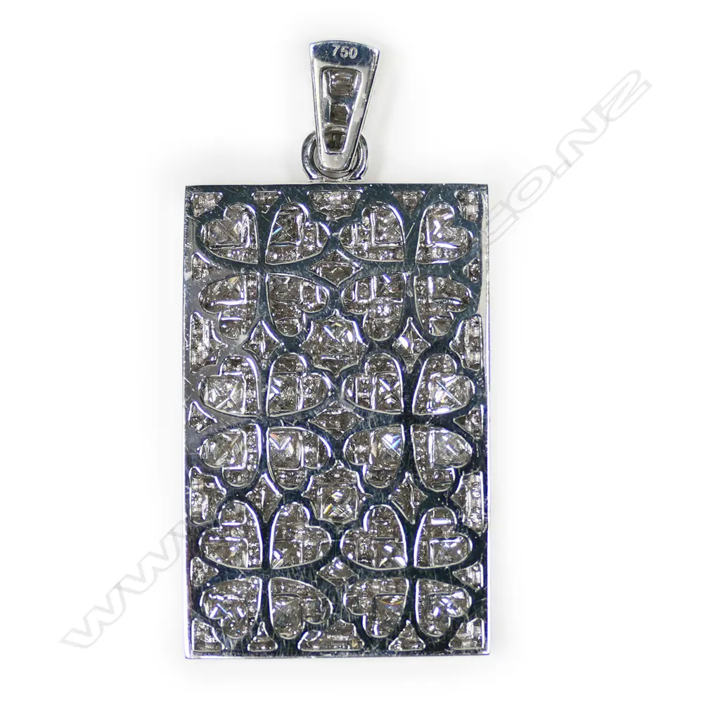 An 18ct white gold and diamond pendant, Image 1++