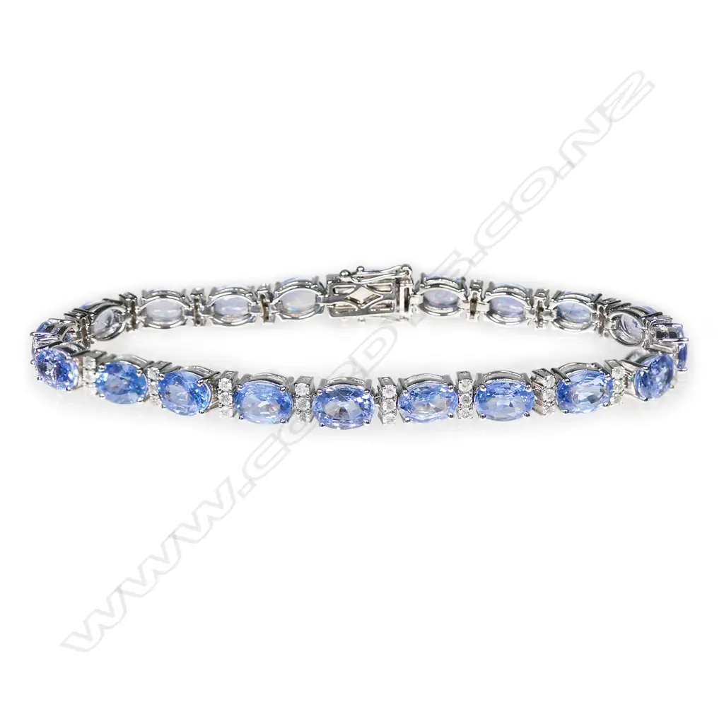 A 14ct white gold, sapphire and diamond line bracelet, Image 1++