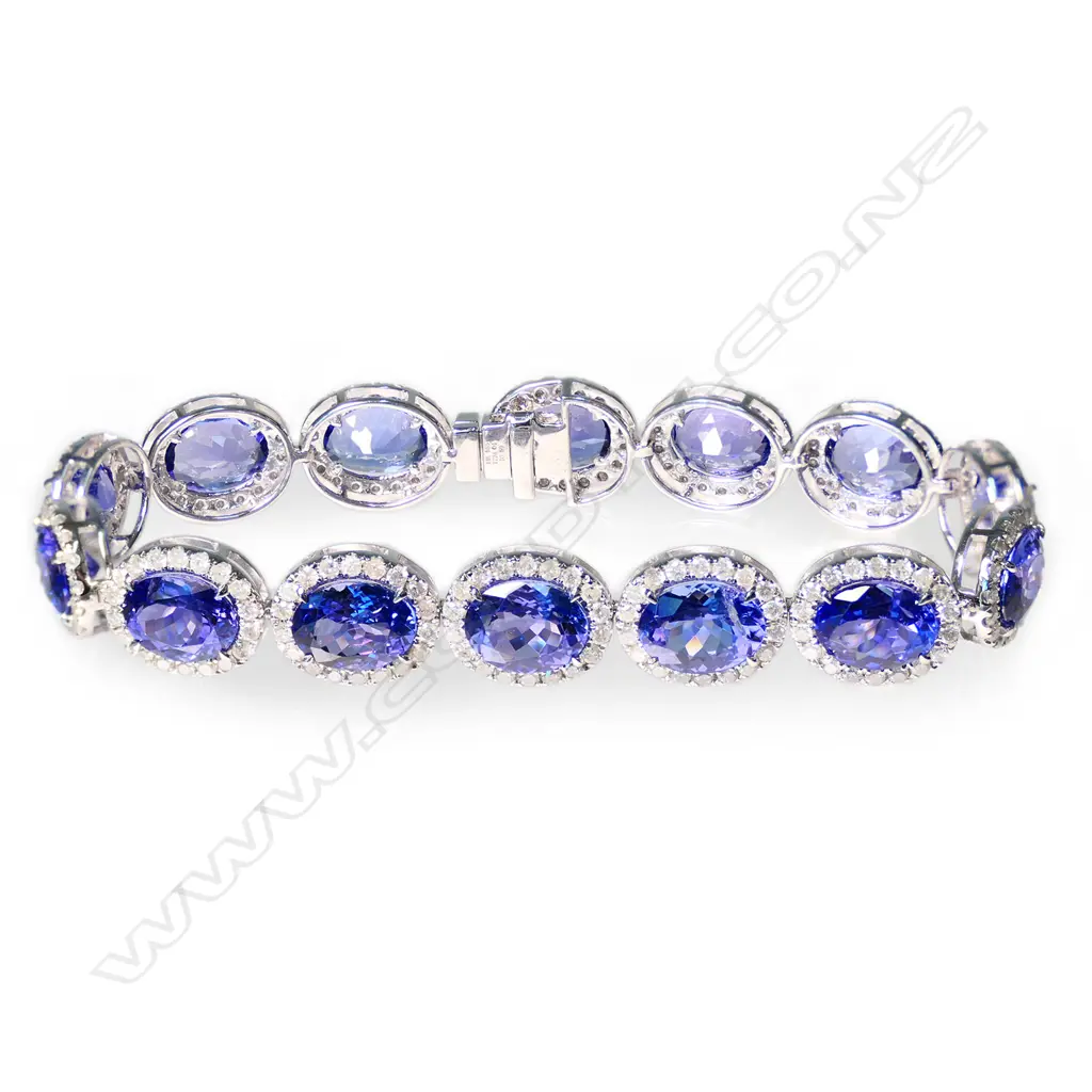 A 14ct white gold, tanzanite and diamond halo bracelet, Image 1++