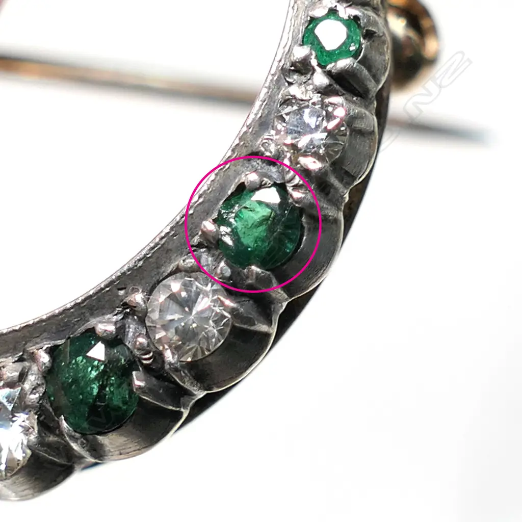 A 1920's 9ct gold, emerald and diamond crescent brooch, Image 1++