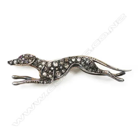 A vintage style gold, silver and diamond brooch,