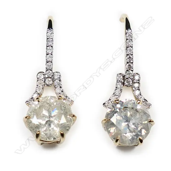 A pair of 14ct gold and diamond drop earrings,