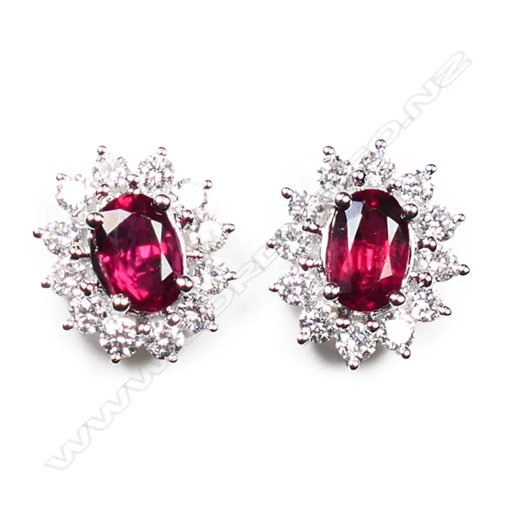 A pair of 18ct white gold, ruby and diamond stud earrings, Image 1++