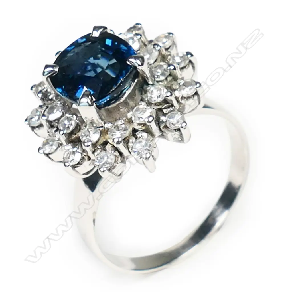 A 9ct white gold sapphire and diamond cluster ring, Image 1++