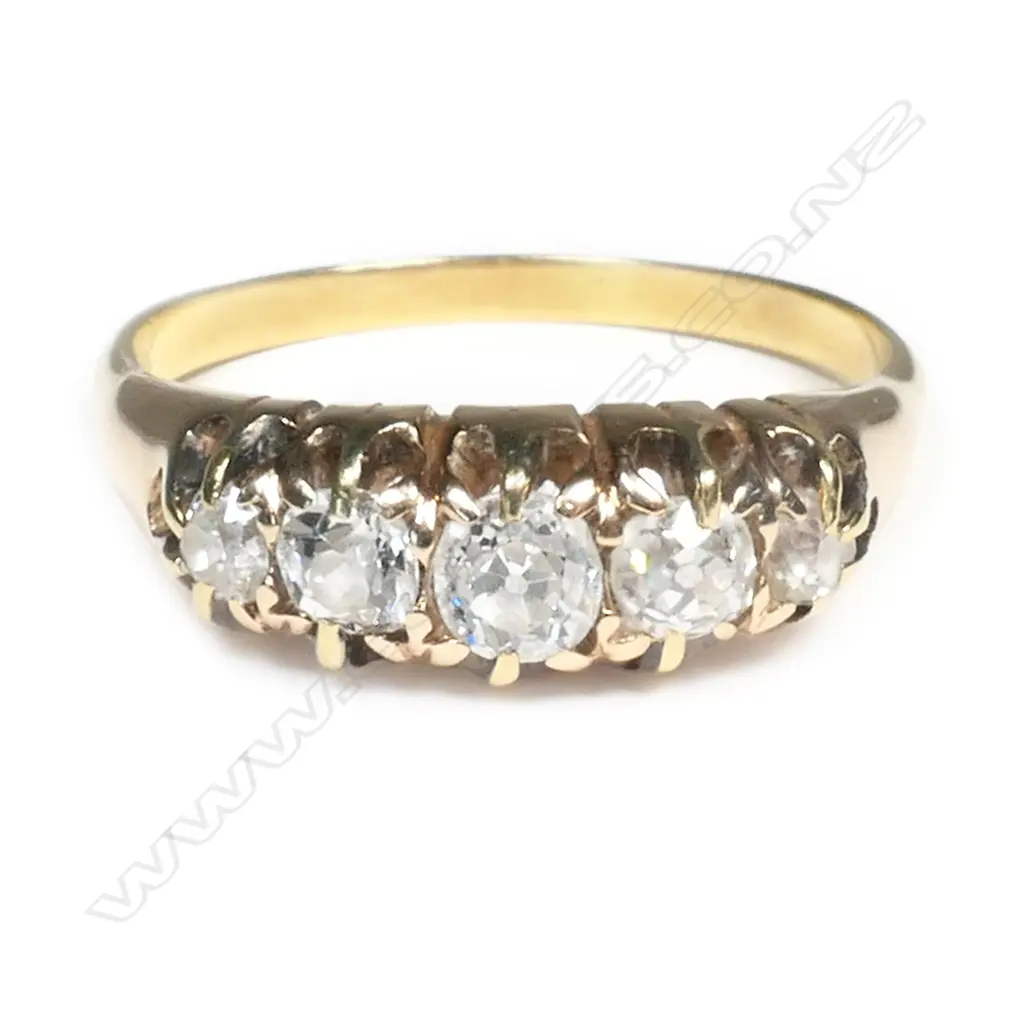 A vintage 18ct yellow gold and diamond bridge ring Image 1++