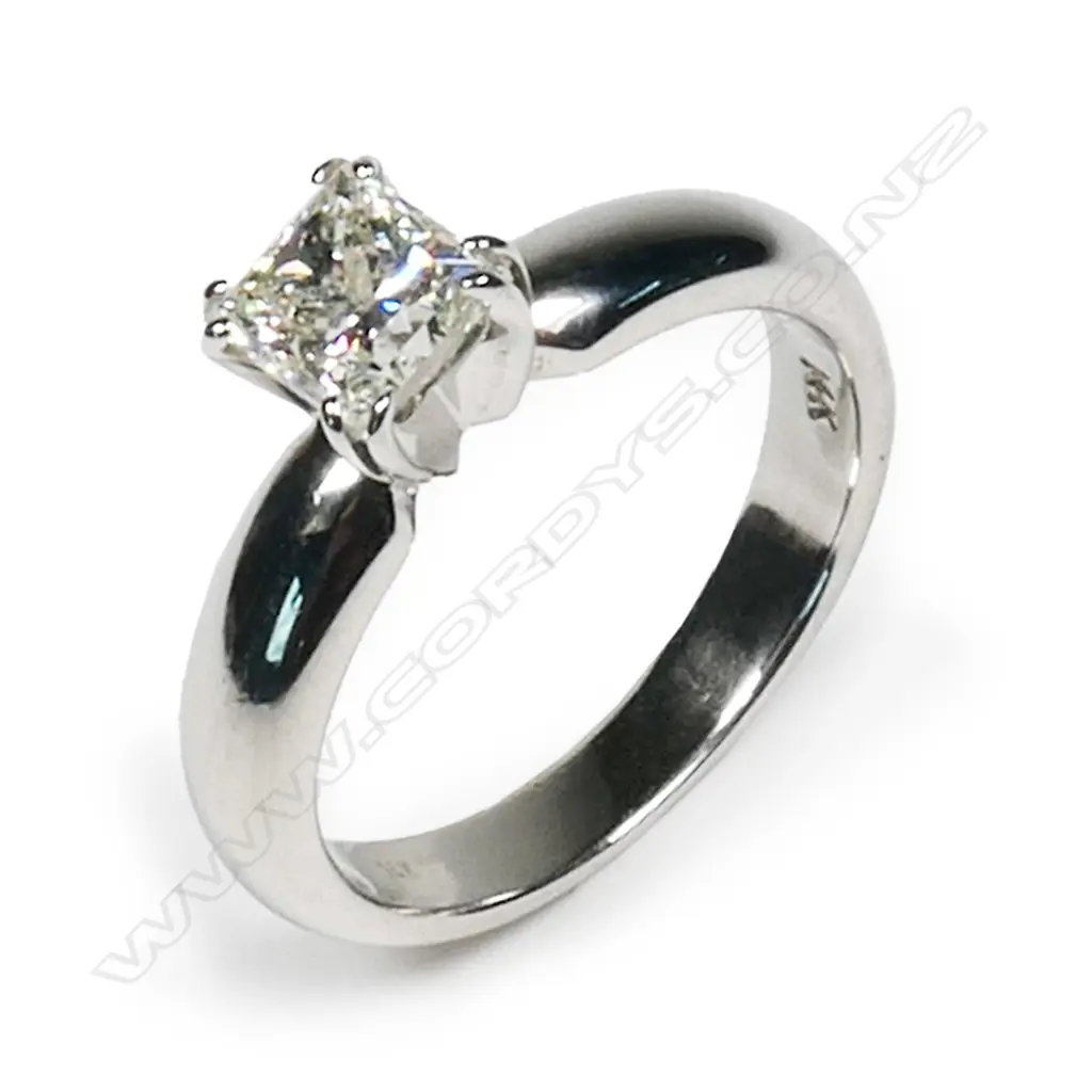 A 14ct white gold and diamond solitaire ring, Image 1++