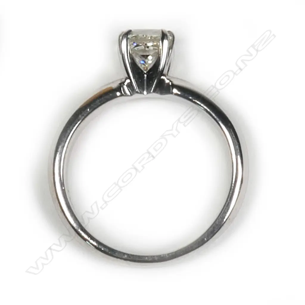 A 14ct white gold and diamond solitaire ring, Image 1++