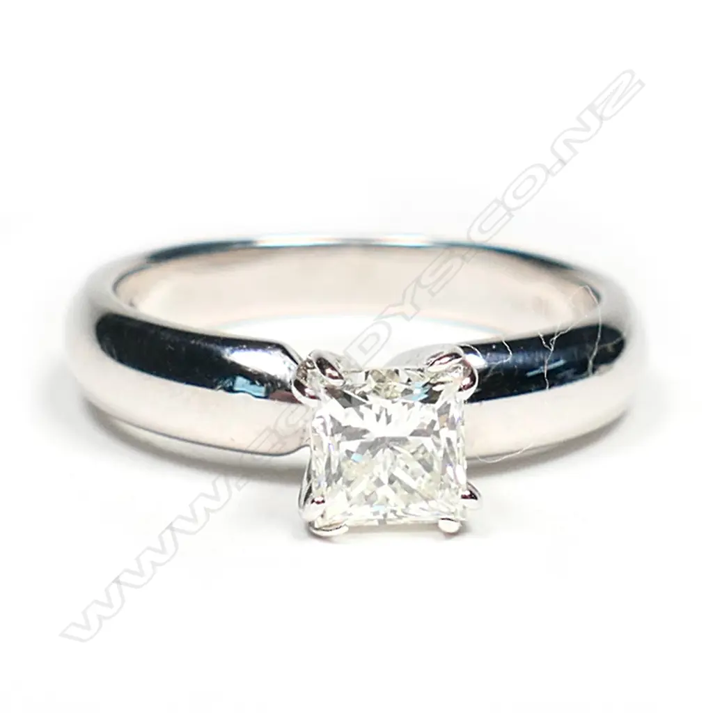 A 14ct white gold and diamond solitaire ring, Image 1++