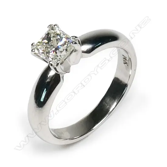 A 14ct white gold and diamond solitaire ring,